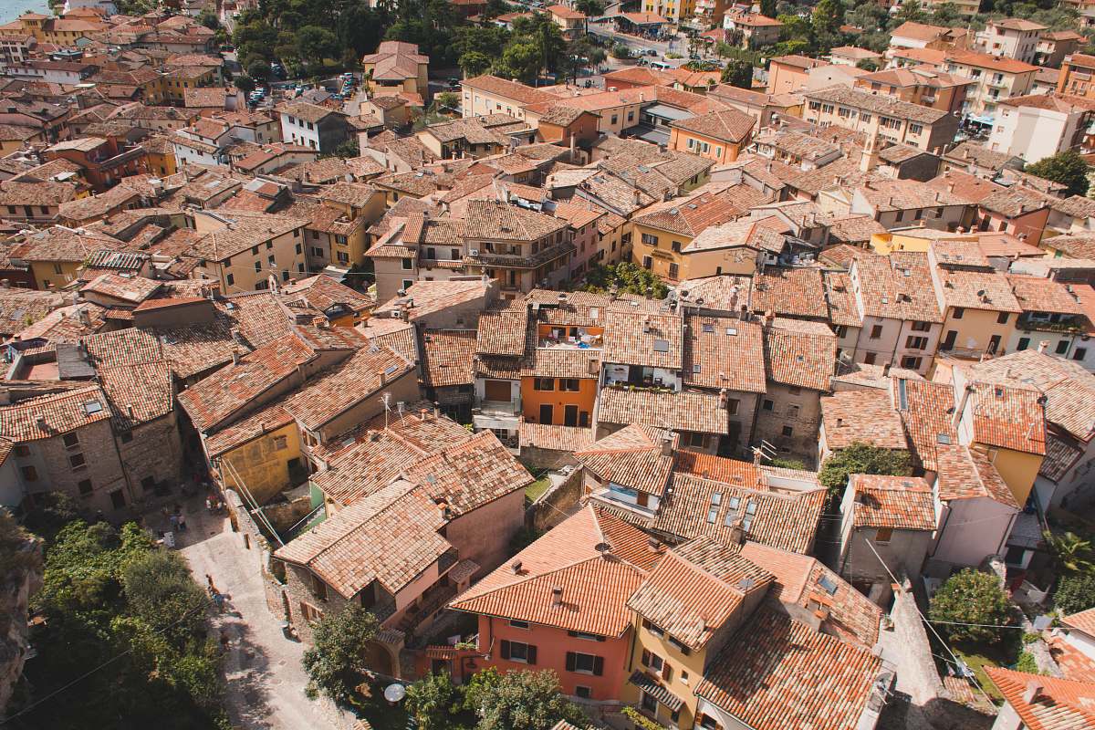 malcesine aerial photography of brown brick house compound italy